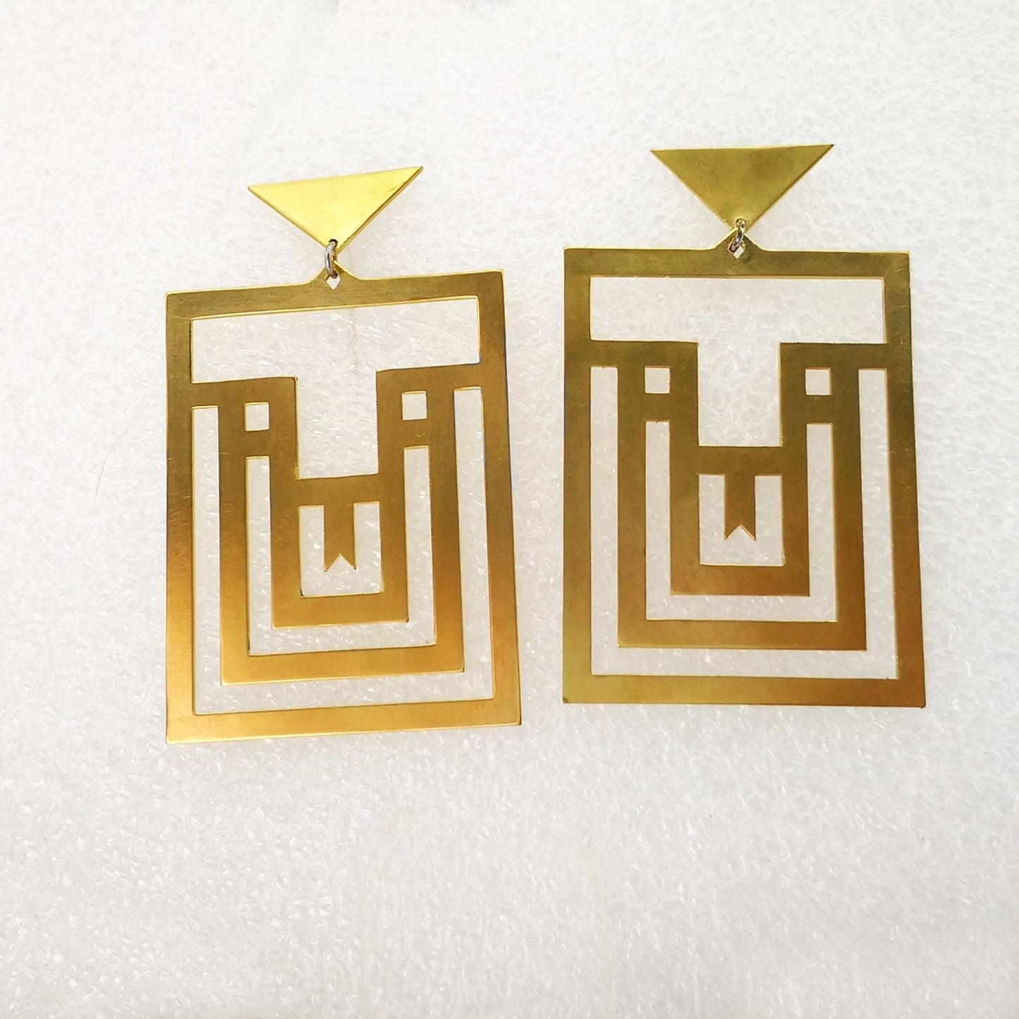 Amaze-maze earrings in satin-polished brass by Banshee The Valkyrie. Gorgeous statement earrings, these have sterling silver hooks.