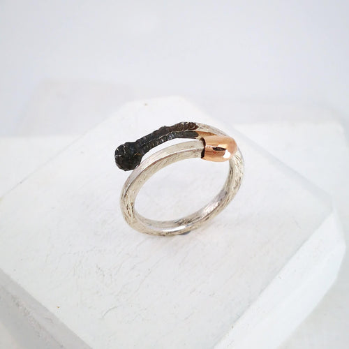 Burnt and Live double ended ring in sterling silver and gold. Handmade NZ jewellery from David McLeod.