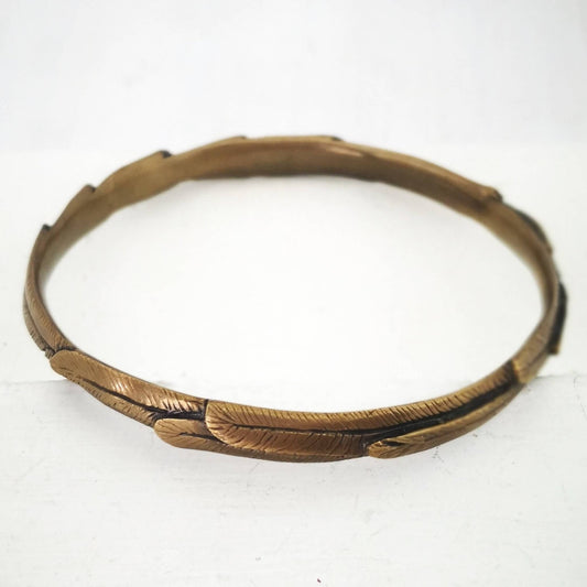 The feather bracelet in warm bronze from iconic NZ jewellery brand The Wild.