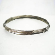 Load image into Gallery viewer, The feather bracelet in oxidised sterling silver from iconic NZ jewellery brand The Wild.
