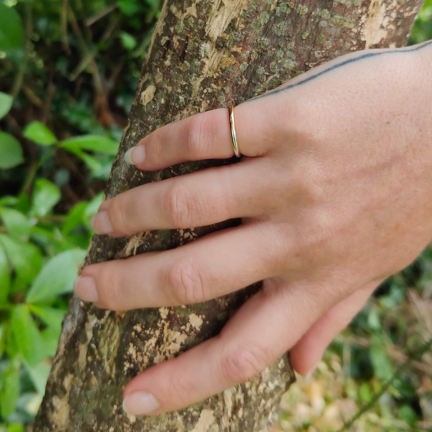 A simple rounded band of rose gold and sterling silver. Handcrafted in NZ by Buster Collins. Quality contemporary jewelry available at Mason & Collins.