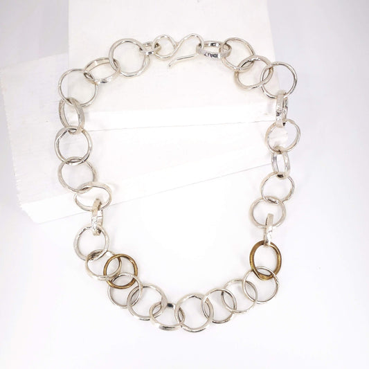 The Organic Tales necklace from Herbert and Wilks is hand crafted and finished each link at a time! Cast in solid sterling silver and bronze, this fabulous piece is a real statement.