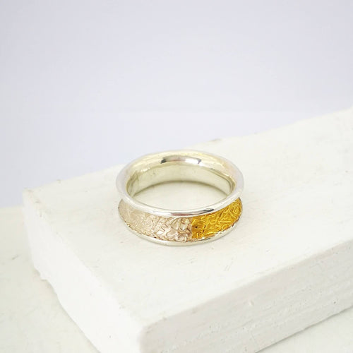 Text-ure ring in silver and gold. NZ made jewellery from David McLeod.
