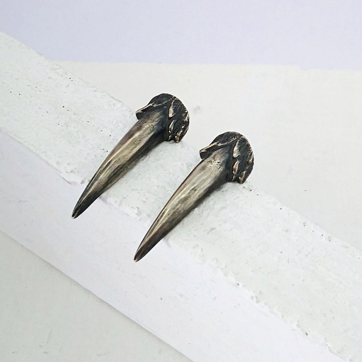 The Ruru Claw Studs in oxidised silver, hand crafted in NZ by The Wild Jewellery.