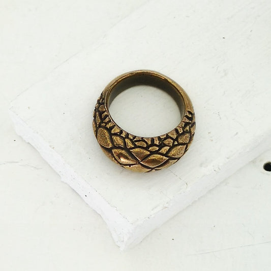 The Tuatara Ring is carved with a scale texture inspired by the skin of the endangered Tuatara. Hand crafted in NZ by The Wild Jewellery.