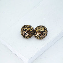 Load image into Gallery viewer, Tuatara Studs in solid bronze and sterling silver, handmade by The Wild Jewellery. These studs are inspired by the texture of the rare Tuatara, a reptile found only in NZ.