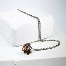 Load image into Gallery viewer, The Very Tiny Bunny necklace by Vaune Mason features a delicately carved bunny charm cast in warm bronze on a sterling silver chain.