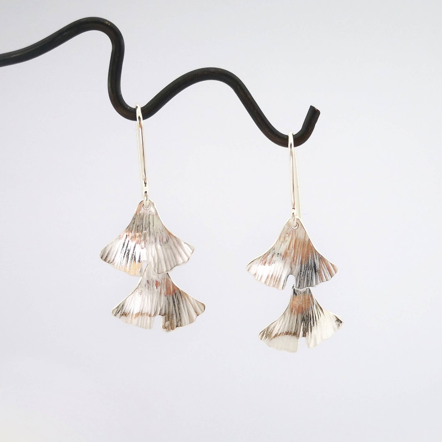 These gorgeous silver Ginkgo leaf earrings are hand-forged. Available at Mason and Collins. 