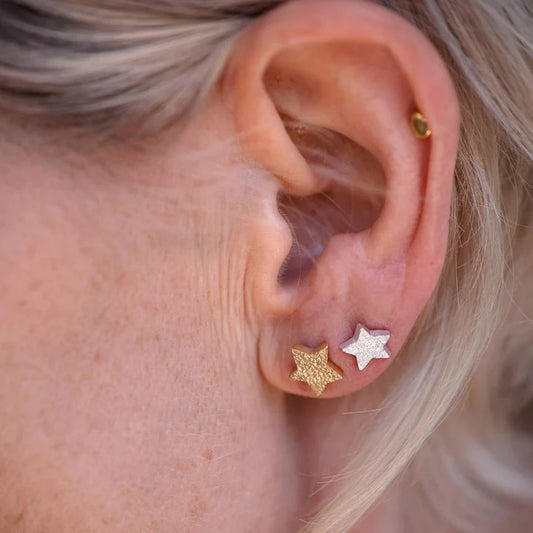Dusted star studs silver