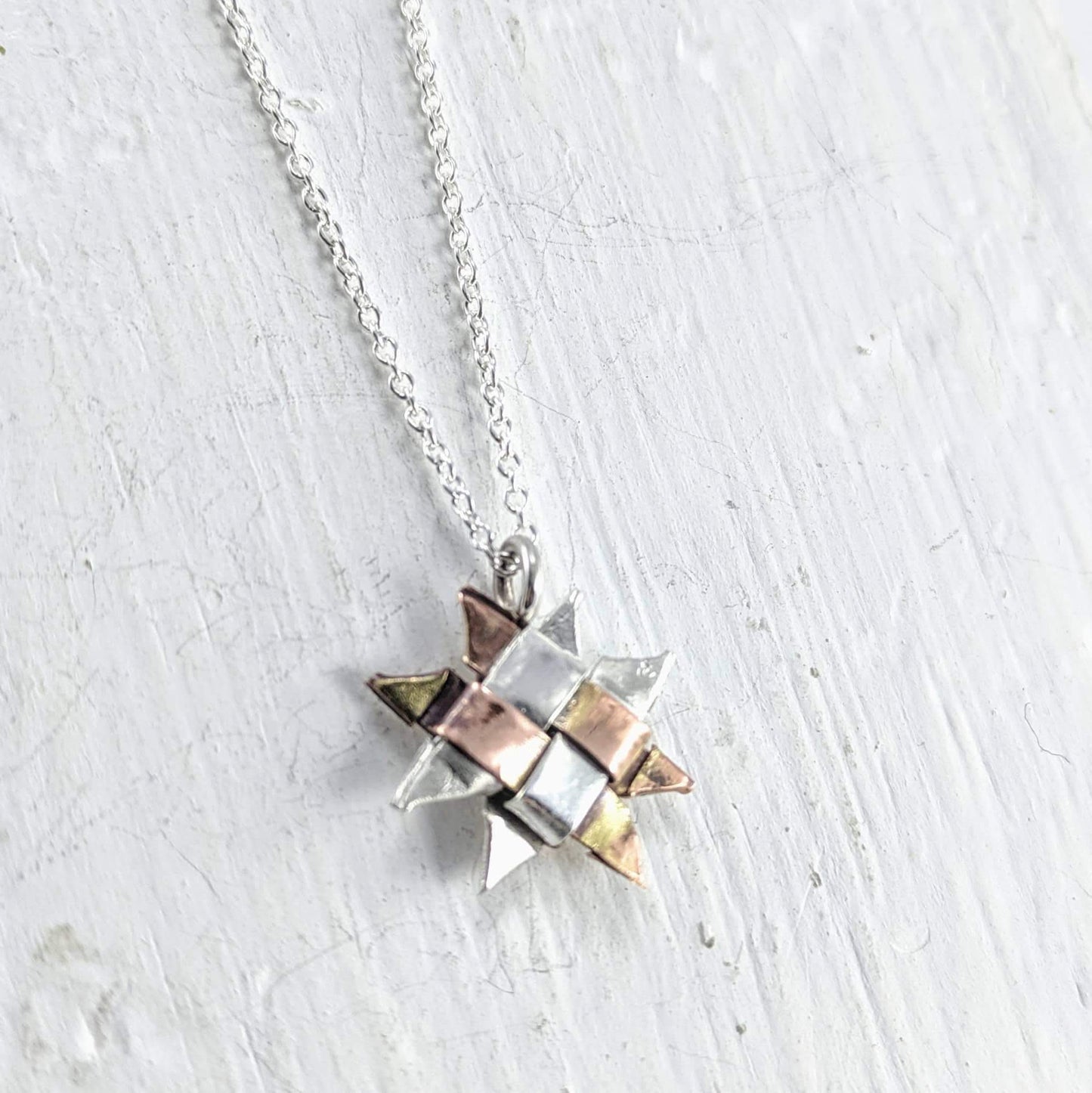 The Whetū (Star) Pendant by Keri-Mei Zagrobelna. Handmade jewellery from NZ artists at Mason and Collins.