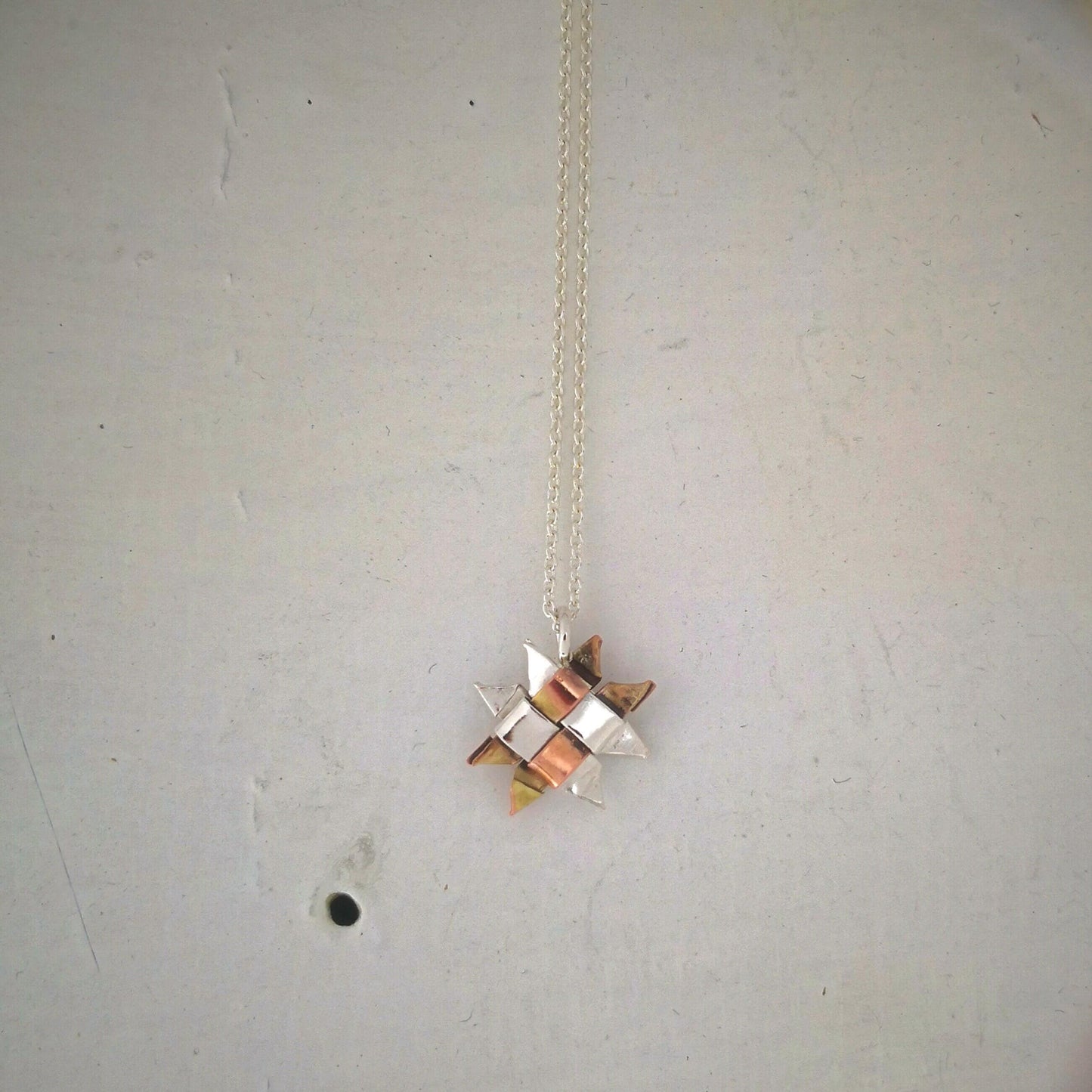 The Whetū  (Star) Pendant by Keri-Mei Zagrobelna. Handmade jewellery from NZ artists at Mason and Collins. 