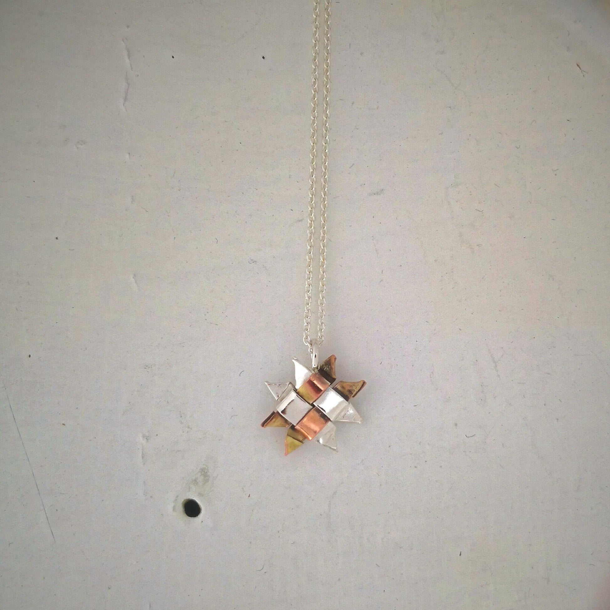 The Whetū  (Star) Pendant by Keri-Mei Zagrobelna. Handmade jewellery from NZ artists at Mason and Collins. 