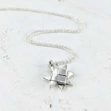 Load image into Gallery viewer, The little Whetū (Star) Pendant is hand crafted in silver by NZ jeweller Keri-Mei Zagrobelna. Available now at Mason and Collins.
