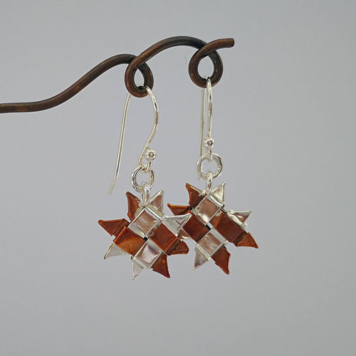 These little Whetū (Star) earrings are hand crafted in copper and fine silver by Keri-Mei Zagrobelna. Available now at Mason and Collins 