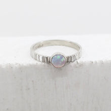 Load image into Gallery viewer, The Hefring in sterling silver set with a little pink synthetic opal. Handcrafted quality silver jewellery from Mason and Collins. 
