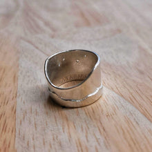 Load image into Gallery viewer, The Matariki Maunga Ring is a wide tapered band hand crafted in solid sterling silver by Buster Collins. Quality NZ silver jewellery available at Mason and Collins.
