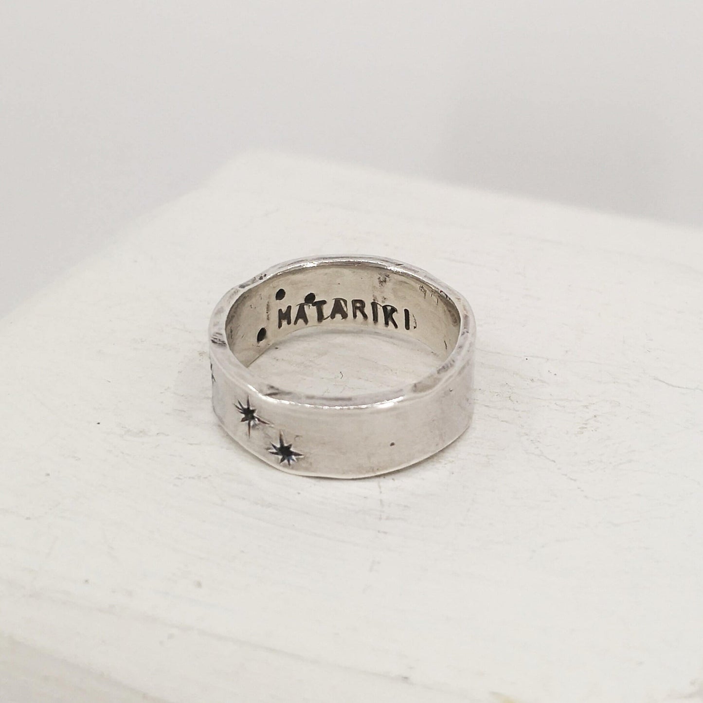 The Matariki ring is hand crafted by NZ jeweller Buster Collins.
