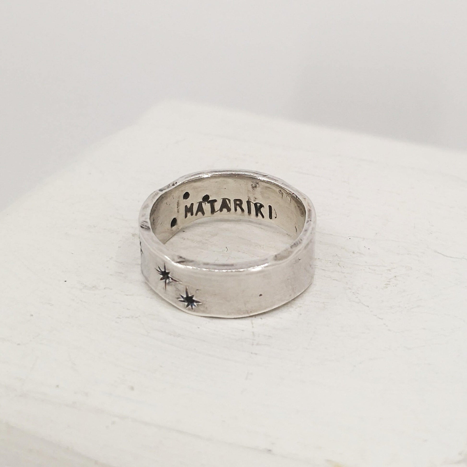The Matariki ring is hand crafted by NZ jeweller Buster Collins.