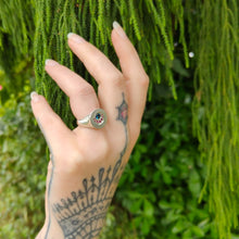 Load image into Gallery viewer, A heavy solid silver ring set with sapphire and rubies in the shape of an eclipse. Hand made quality silver jewellery by NZ jewellers at Mason and Collins.
