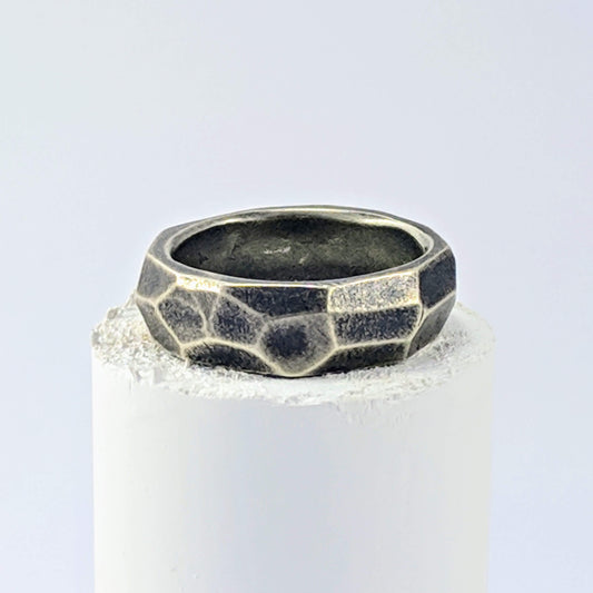 The Angle Ring is a signature design from NZ jeweller Buster Collins. A chunky and comfortable ring in sterling silver or warm bronze.