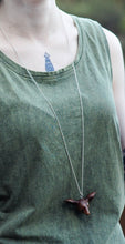 Load image into Gallery viewer, Our model wears the Doe&#39;s Head Necklace by NZ jeweller Vaune Mason.
