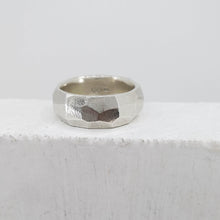 Load image into Gallery viewer, The Angle Ring is a signature design from NZ jeweller Buster Collins. A chunky and comfortable ring in sterling silver or warm bronze.
