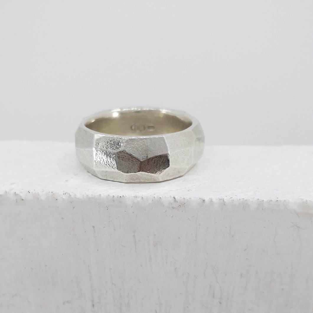 The Angle Ring is a signature design from NZ jeweller Buster Collins. A chunky and comfortable ring in sterling silver or warm bronze.