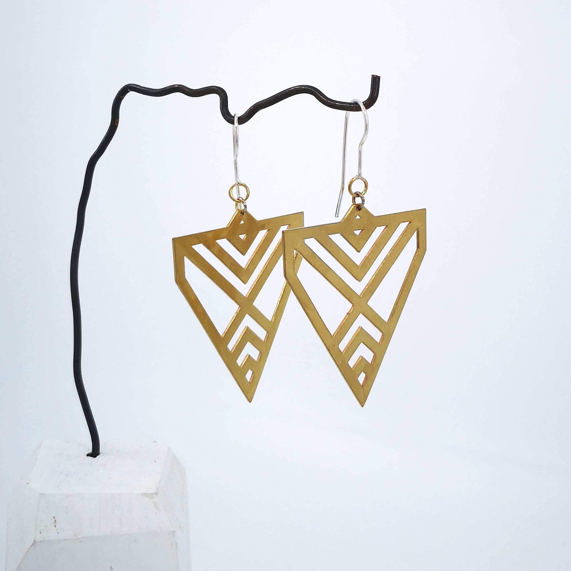The Aronui earrings in brass on sterling silver hooks. Quality NZ made jewellery from Banshee the Valkyrie at Mason & Collins.