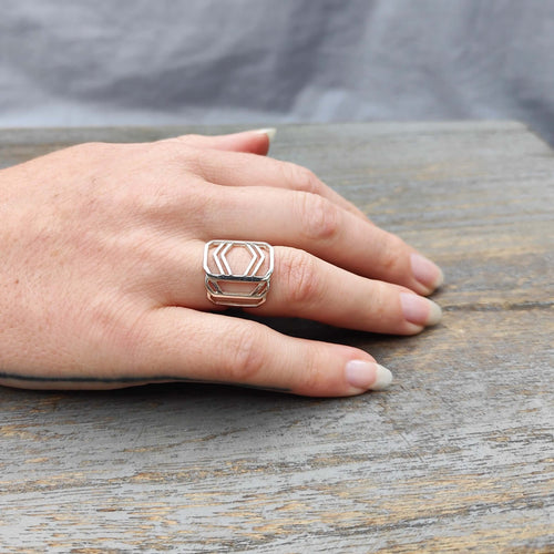 An elegant statement ring from GG Jewellery in polished sterling silver. Available at Mason and Collins. 
