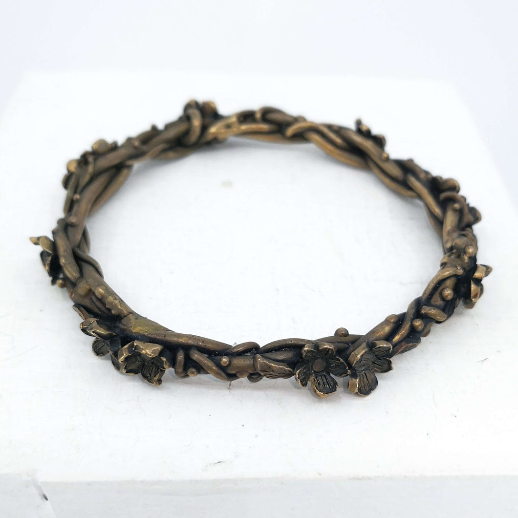 The bronze Twisting Vines bracelet by Herbert & Wilks. Quality NZ jewellery available at Mason & Collins.