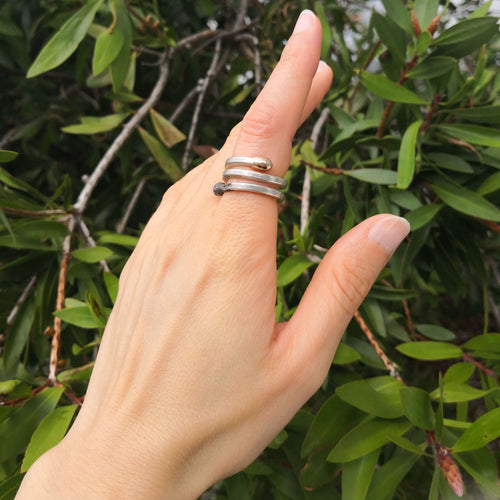The Burnt and Live Match Stick ring as a wide double wrap open ring. An iconic design from NZ contemporary jeweller David McLeod. Available at Mason & Collins.
