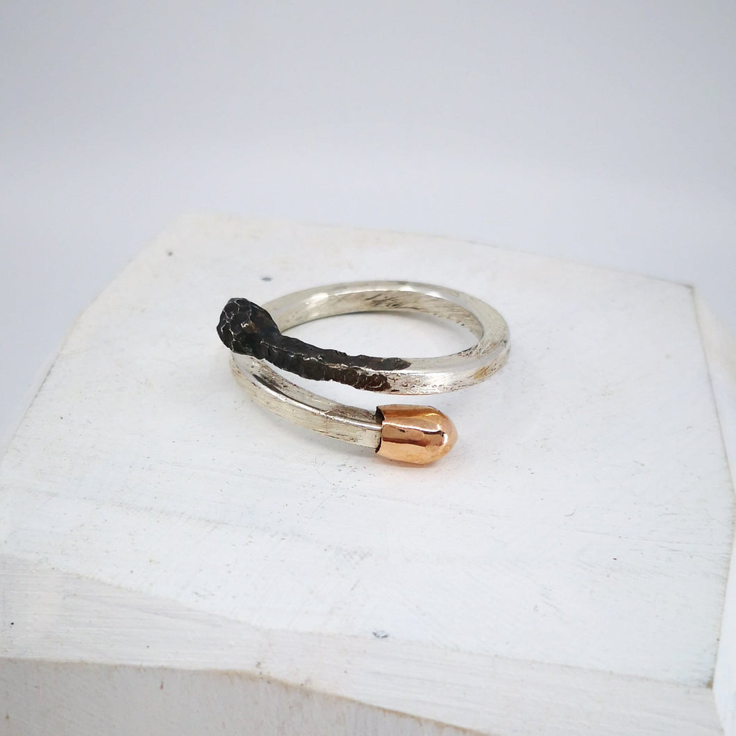 Burnt and Live double ended ring in sterling silver and gold. Handmade NZ jewellery from David McLeod.