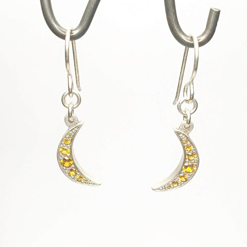 These delicate silver moons are set with beautiful citrines. Hand crafted NZ jewellery by Adele Stewart. Available now at Mason and Collins. 