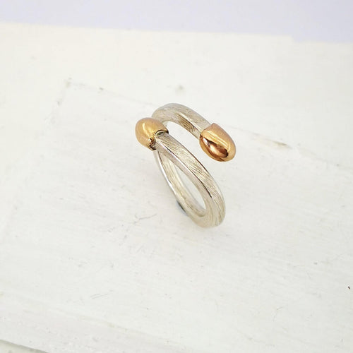 The Live/Live Matchstick ring in silver and gold by NZ jeweller David McLeod.