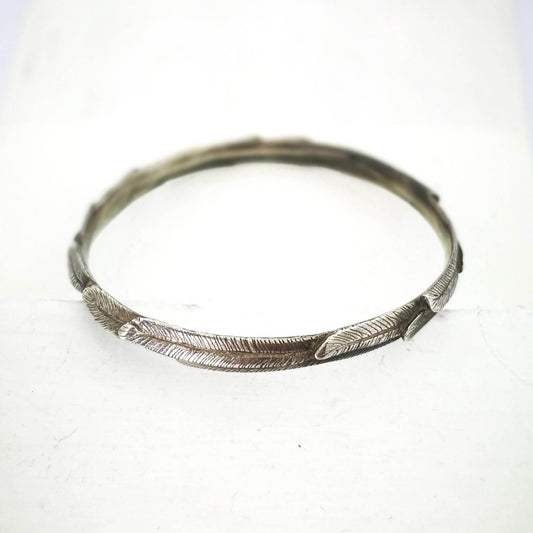The feather bracelet in oxidised sterling silver from iconic NZ jewellery brand The Wild.