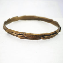 Load image into Gallery viewer, The feather bracelet in warm bronze from iconic NZ jewellery brand The Wild.
