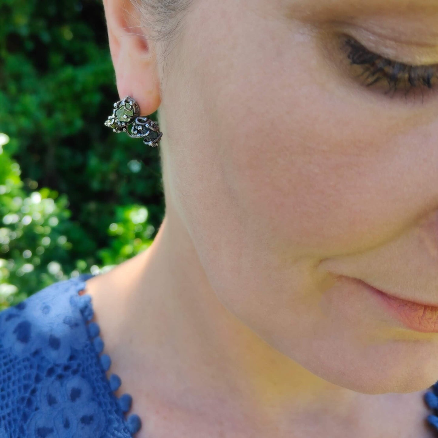 The gemstone cluster studs are totally one-of-a-kind, featuring raw gemstones in oxidised sterling silver. By NZ jeweller Vaune Mason.