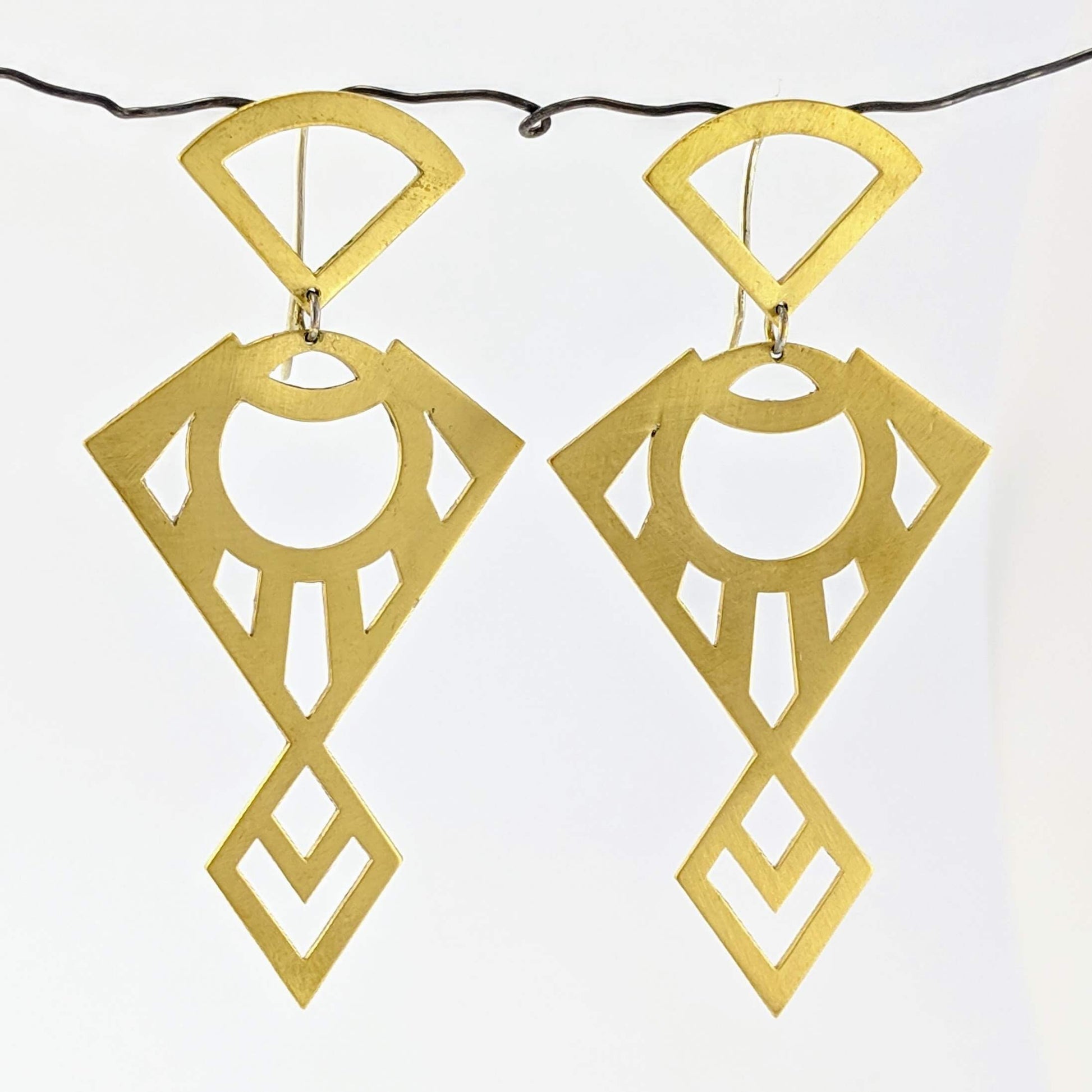 Goody Goody Seraphim earrings, handmade in solid brass by NZ jeweller Banshee the Valkyrie. These earrings have solid silver hooks. 
