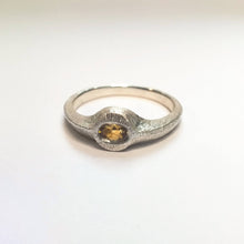 Load image into Gallery viewer, The Kowhai Seed Ring by Adele Stewart is handcrafted NZ jewellery made in sterling silver set with a yellow tournaline.
