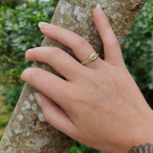 Load image into Gallery viewer, The Kowhai Seed Ring by Adele Stewart is handcrafted NZ jewellery made in sterling silver set with a yellow tournaline.
