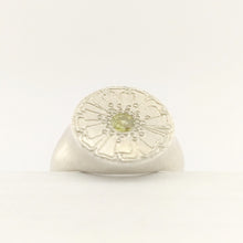 Load image into Gallery viewer, The Mount Cook Buttercup signet ring by Adele Stewart. NZ jewellery, handcrafted in sterling silver and set with a AAA grade yellow sapphire. 
