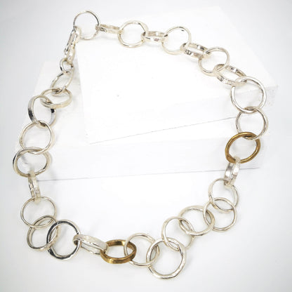 The Organic Tales necklace from Herbert and Wilks is hand crafted and finished each link at a time! Cast in solid sterling silver and bronze, this fabulous piece is a real statement. 