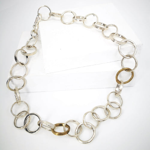 The Organic Tales necklace from Herbert and Wilks is hand crafted and finished each link at a time! Cast in solid sterling silver and bronze, this fabulous piece is a real statement. 