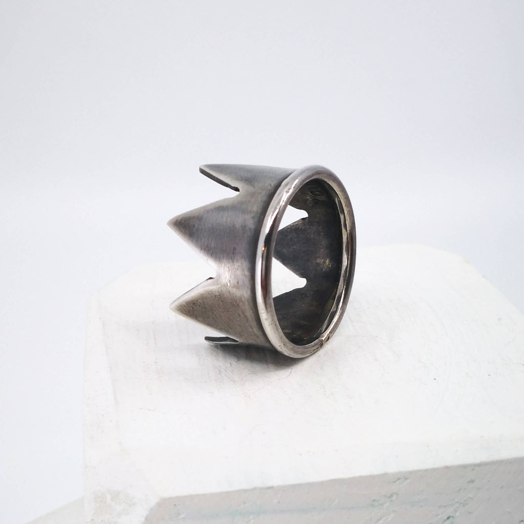 The oxidised silver Crown Ring is handmade in NZ by jeweller Buster Collins.