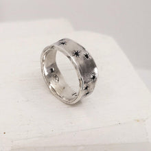 Load image into Gallery viewer, The Matariki ring is hand crafted by NZ jeweller Buster Collins.
