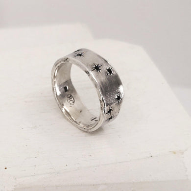 The Matariki ring is hand crafted by NZ jeweller Buster Collins.