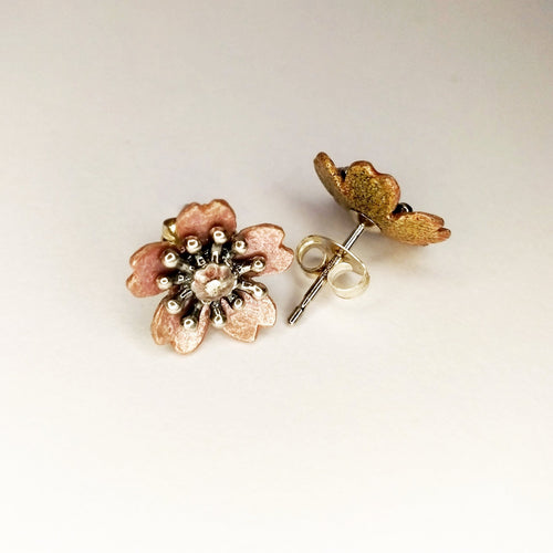 These pink Cherry Blossom Studs are hand crafted in pale pink glass enamel on argentium silver. Handmade in NZ.