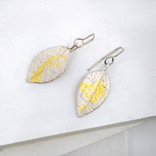 Load image into Gallery viewer, The Pohutukawa earrings from Herbert &amp; Wilks are textured with a delicate lace pattern and 24 carat gold leaf. Available now from Mason and Collins.
