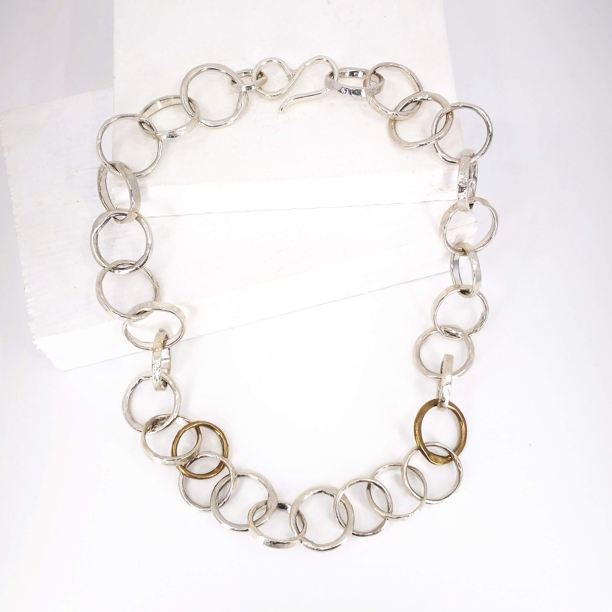 The Organic Tales necklace from Herbert and Wilks is hand crafted and finished each link at a time! Cast in solid sterling silver and bronze, this fabulous piece is a real statement.