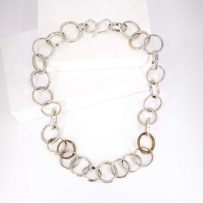 The Organic Tales necklace from Herbert and Wilks is hand crafted and finished each link at a time! Cast in solid sterling silver and bronze, this fabulous piece is a real statement.